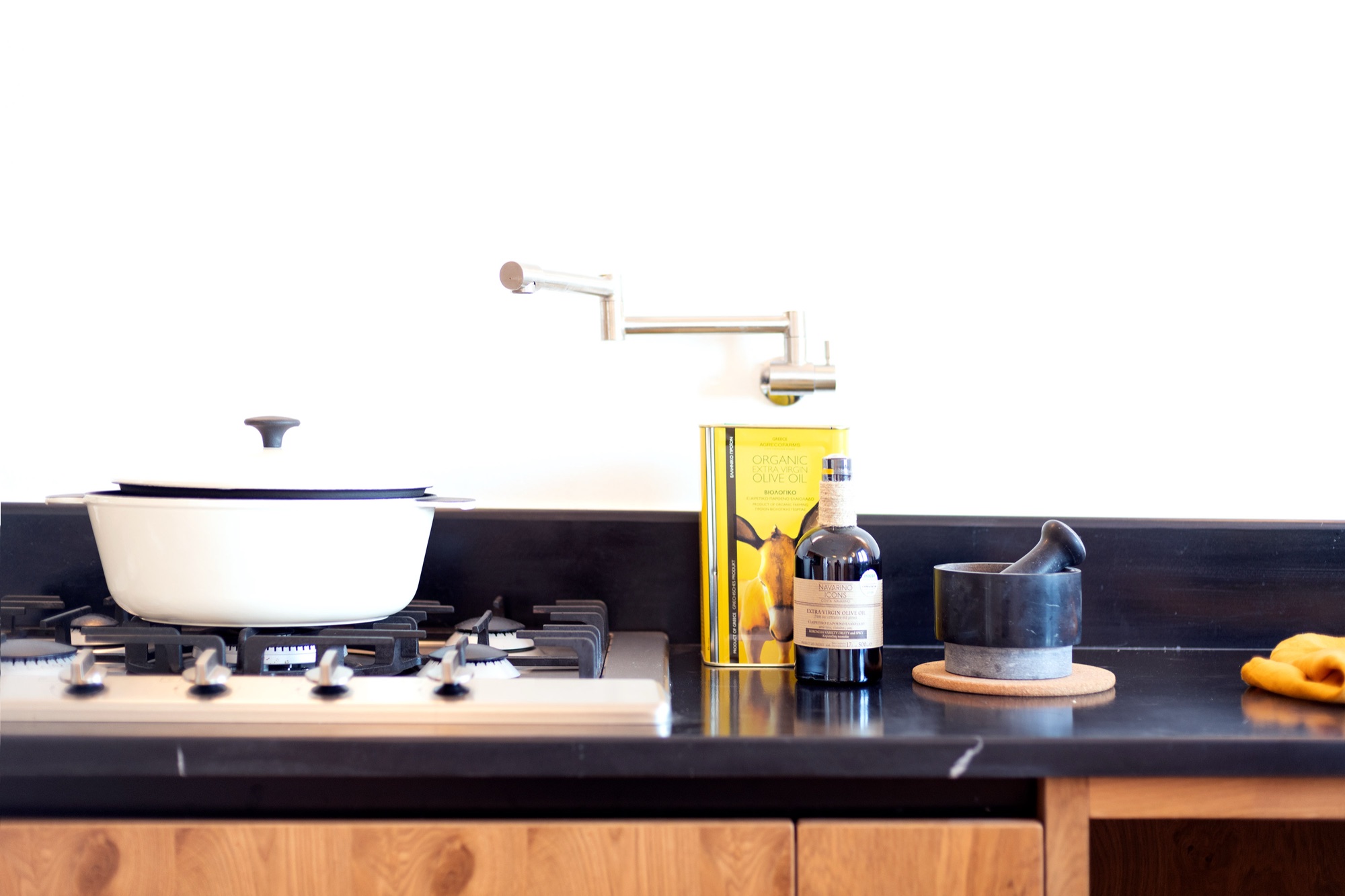 Kitchen counter detail, stove and local olive oil